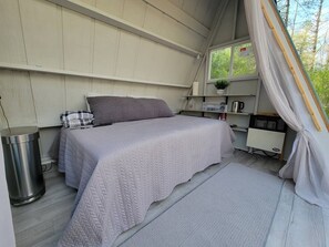 Clean, inviting space, mosquito net