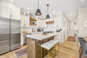 Cook with ease in a fully equipped, stylish, and spacious kitchen.