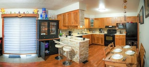 Open floor plan with kitchen and dining areas