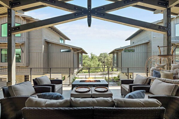 Our balcony with a gas firepit sets the scene for peaceful mornings and starry evenings.