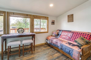 Living Area | Queen Futon | 2-Person Dining Table | Free WiFi