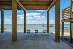 Enjoy serene bayfront seating – the perfect spot for morning coffee or sunset cocktails.