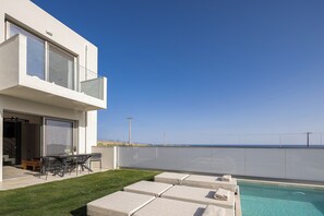 Soak in seaside serenity from your private 20m² heated pool.
