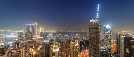 Skyline View: Revel in breathtaking city lights from your private balcony !