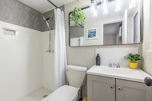 Elegant bath retreat with walk-in shower & contemporary design