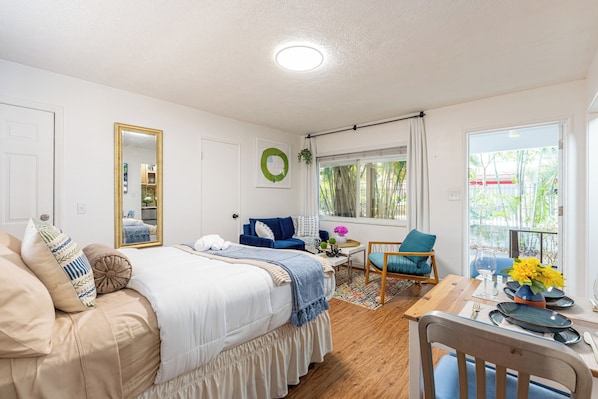 Rest easy in a queen bed with blackout curtains in Las Olas Isles studio