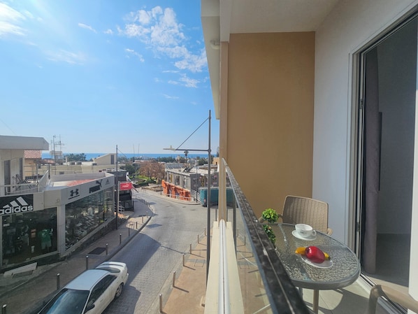 Private balcony facing the street, center and sea