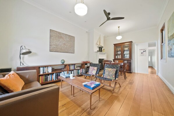Browse the bookshelf, brew a cuppa, and make yourself at home in the character-filled living area.