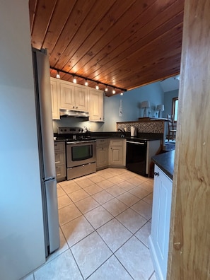 Few Steps up from the entry way is the Kitchen
