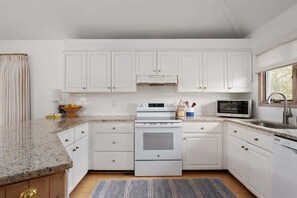 Enjoy mealtime in our fully stocked kitchen!