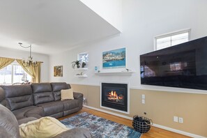 Recliners and TV in first floor living area.