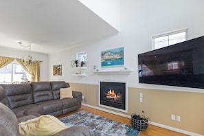Recliners and TV in first floor living area.