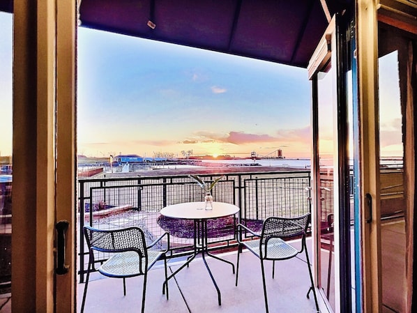 Step out onto your private balcony for breathtaking sunsets over the lake—ideal for evening wine or morning coffee with a view.