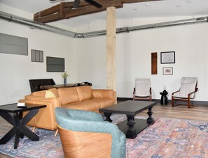 Living room with ample seating areas and space
