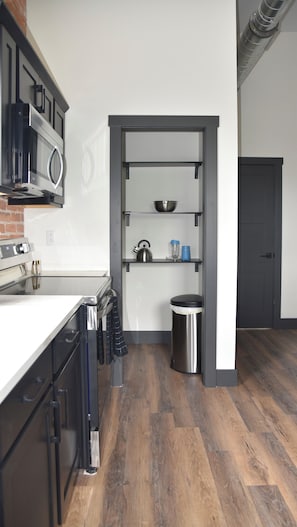 There is a pantry for additional dry storage