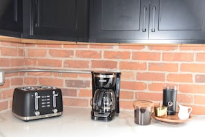 Coffee maker, toaster, and all cooking supplies/amenities are provided