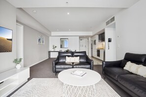 Spacious and cozy living area for the guests to relax