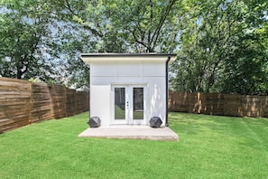 ADU - Dedicated Home Office with 55'inch screen perfect for conference calls. Comes with whiteboard and 27" monitor and an adjustable stand up desk.