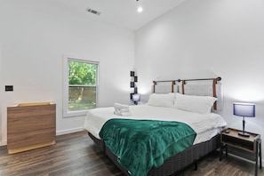 Your cozy master bedroom with king sized bed! Your perfect retreat for relaxing and recharging. Enjoy the laid-back vibes and wake up ready to take on the day.