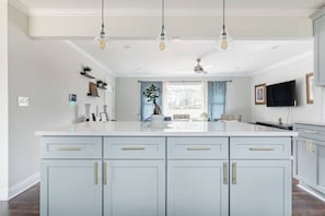 Open concept perfect to sit 4+ people comfortably on kitchen highlight