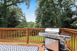 A closer look at your grill, where you can indulge in the pleasure of cooking amidst a breathtaking view of lush greeneries.