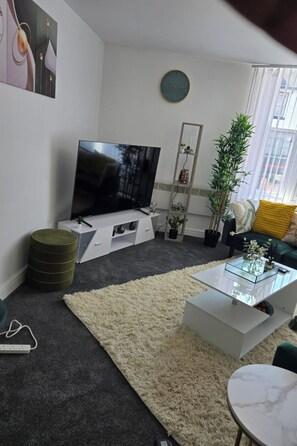 Beautiful set up living room with plenty of seating