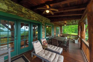 The perfect spot to relax—plush seating and a dining area on the deck, where every meal feels like a celebration in nature.

