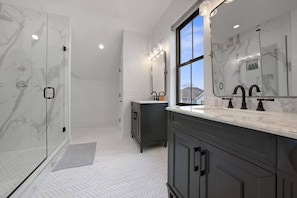 Self-care starts here—enjoy a luxurious soak or an invigorating shower with premium toiletries