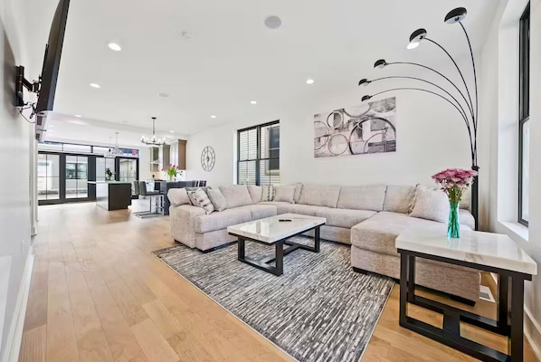Feel at home in a living room designed for cozy evenings and relaxing vibes