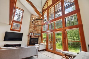 Main Living Space - Gas Fireplace, TV, Deck Access and Slope Views