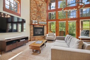Main Living Space - Gas Fireplace, TV, Deck Access and Slope Views