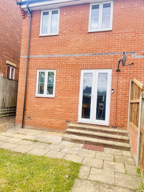 back garden with access to allocated car park