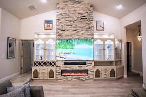 Apollos Anchor Living Room with Large TV and Fireplace