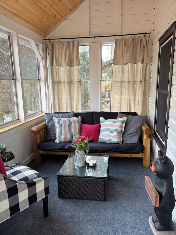 Relaxing our newly renovated sun porch.