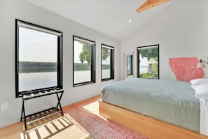 All three bedrooms have a view of the river, two of them feel like you're right on the water
