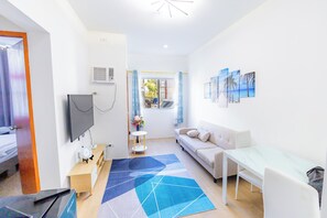 Spacious living room with smart TV and wifi