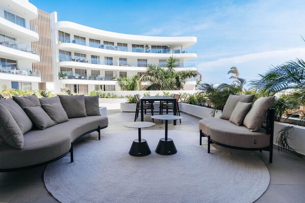 Kick back and soak up the sun on your private terrace at ONE Mambo 6—perfect for morning coffee, sunset drinks, or just relaxing with a view!