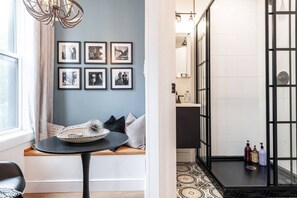 Modern ensuite with walk-in glass shower—perfect for freshening up before exploring Stratford’s vibrant arts scene.