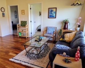 Central area for hanging out, dining, and watching movies on the lg. Smart TV.