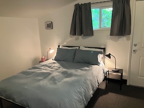 Queen bed with space on both sides