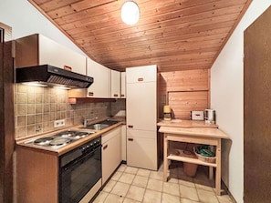 Wood, Ceiling, Interior Design, Cabinetry, Kitchen, Home, Wood Stain, Countertop, Room, Hardwood