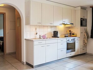 Kitchen, Countertop, Kitchen Appliance, Major Appliance, Cabinetry, Furniture, Interior Design, Flooring, Kitchen Sink, Floor