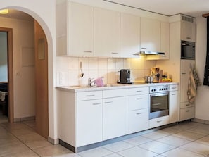 Kitchen, Countertop, Kitchen Appliance, Major Appliance, Cabinetry, Furniture, Interior Design, Flooring, Kitchen Sink, Floor
