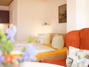 Furniture, Interior Design, Wood, Room, Orange, Home, Ceiling, Chair, Cushion, Living Room