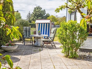 Furniture, Shrub, Outdoor Furniture, Garden, Chair, Flowerpot, Shade, Landscaping, Yard