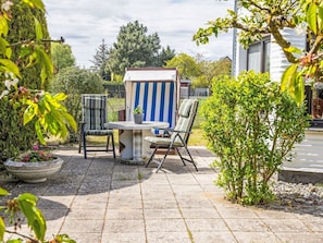 Furniture, Shrub, Outdoor Furniture, Garden, Chair, Flowerpot, Shade, Landscaping, Yard