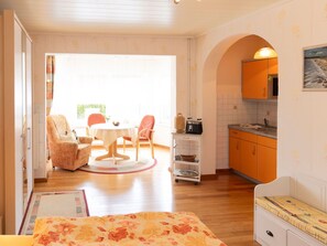 Furniture, Interior Design, Flooring, Floor, Wood, Ceiling, Couch, Room, Living Room, Table