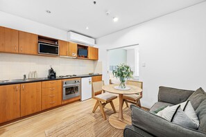 Discover this superior apartment, featuring a kitchenette , a cozy dining area, and a comfortable living space. Perfect for your next getaway!