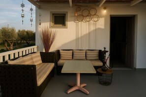 Cozy outdoor patio with seating for relaxing evenings.