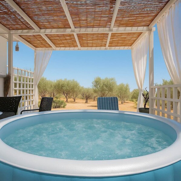 Hot tub area, with a private patio